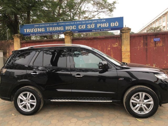 Cần bán gấp Hyundai Santa Fe sản xuất 2009, màu đen0