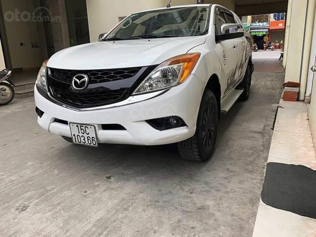 Cần bán xe Mazda BT 50 sản xuất năm 2014, màu trắng, nhập khẩu nguyên chiếc còn mới