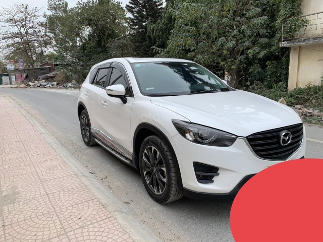 Bán gấp Mazda CX 5 bản 2.0 AT màu trắng, với giá siêu ưu đãi, chỉ 675tr0