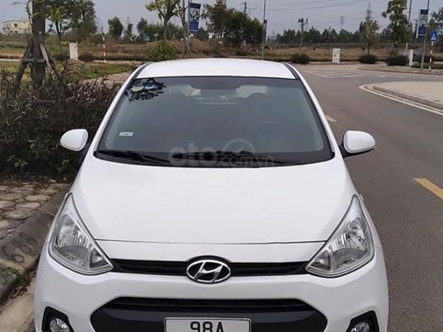 Cần bán lại xe Hyundai Grand i10 sản xuất năm 2014, màu trắng0