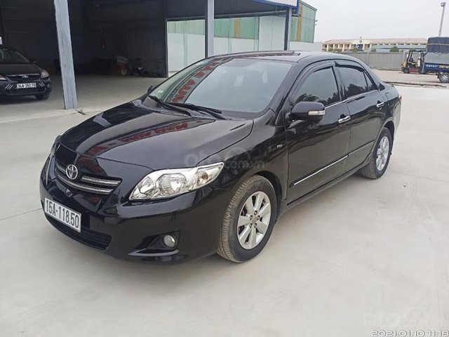 Bán Toyota Corolla Altis sản xuất 2009, màu đen chính chủ0