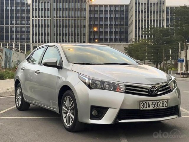 Cần bán Toyota Corolla Altis 1.8G AT sản xuất 2015, màu bạc, 585 triệu