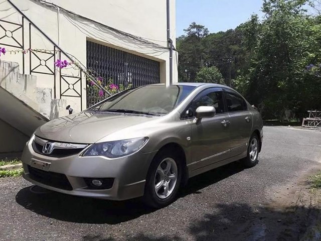 Bán Honda Civic 1.8AT đời 2009, màu vàng0