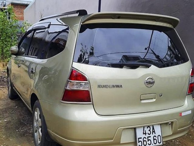 Bán Nissan Grand livina 1.8 AT sản xuất năm 2010, màu vàng0