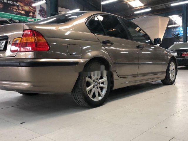 Cần bán lại xe BMW 3 Series năm 2004, màu nâu0