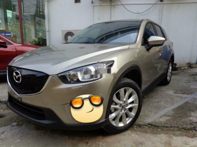 Bán Mazda CX 5 năm sản xuất 2015, màu vàng 0