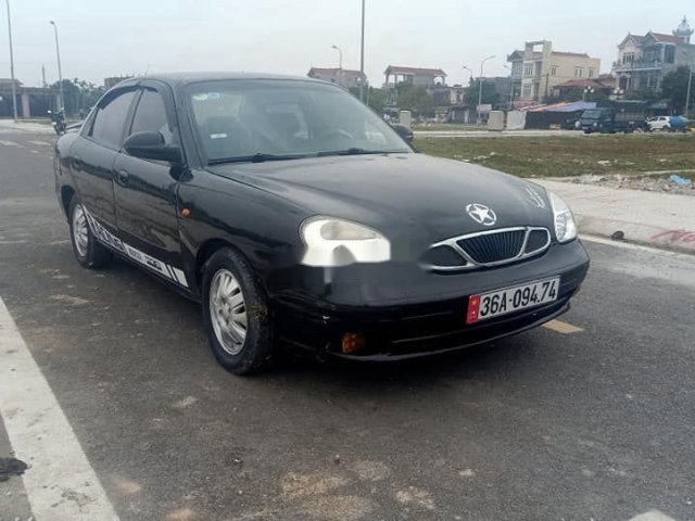 Bán xe Daewoo Nubira 2003, màu đen, giá chỉ 72 triệu0