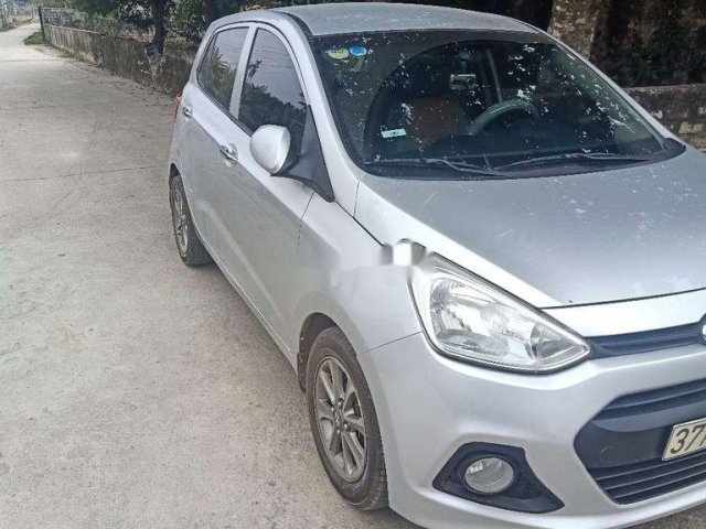 Bán xe Hyundai Grand i10 năm sản xuất 2016, màu bạc0