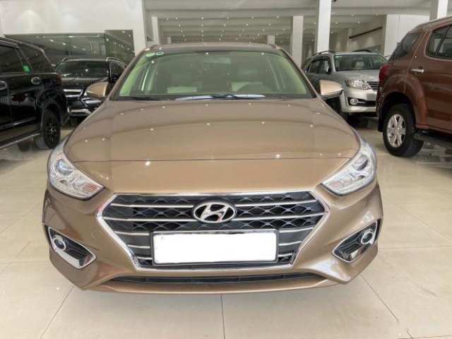 Cần bán xe Hyundai Accent 1.4AT sản xuất năm 2019, màu vàng0