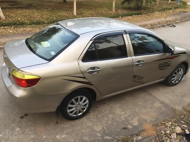 Bán Toyota Vios đời 2004, màu vàng cát0