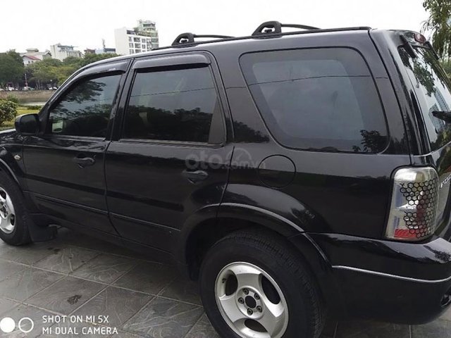 Bán Ford Escape đời 2004, màu đen còn mới