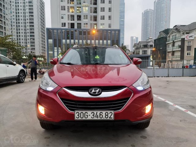 Cần bán lại xe Hyundai Tucson 2.0 AT năm 2010, màu đỏ, nhập khẩu0