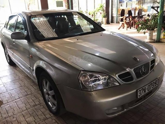 Cần bán Daewoo Magnus năm sản xuất 2002, màu bạc0