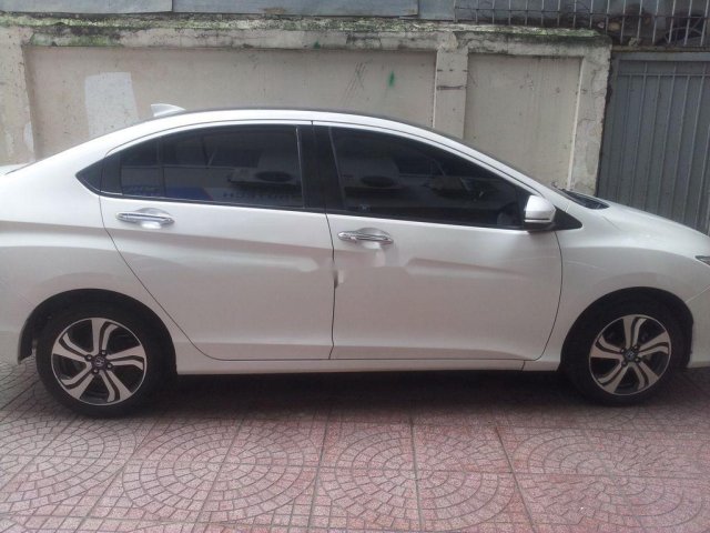 Cần bán gấp Honda City trắng 1.5 AT sản xuất 2014, xe nhập