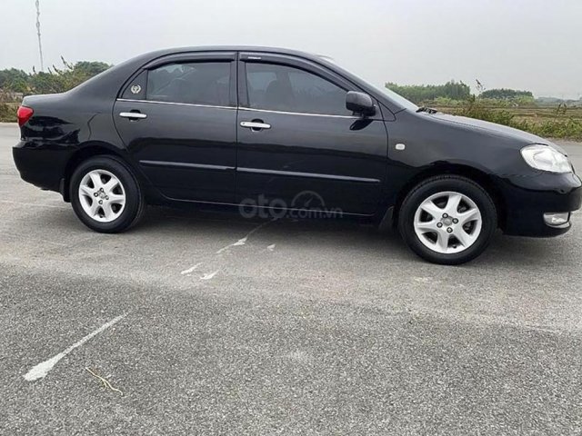 Bán Toyota Corolla Altis năm sản xuất 2005, màu đen, giá tốt0