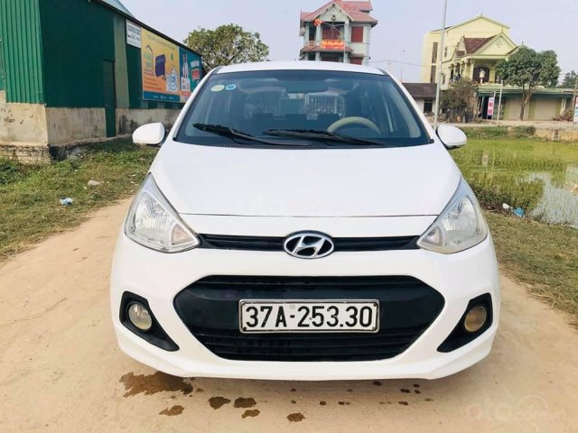 Bán nhanh xe Hyundai Grand i10 năm 2015, màu trắng số sàn0