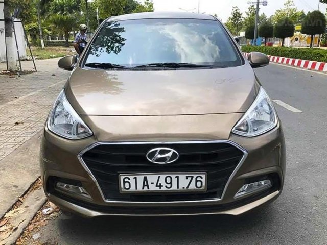 Bán ô tô Hyundai Grand i10 sản xuất năm 2018, màu vàng còn mới, giá tốt