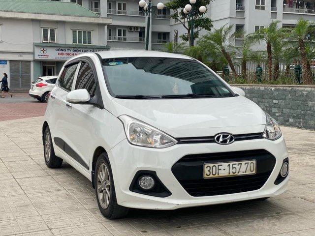 Bán gấp ô tô Hyundai Grand i10 1.2AT năm 2016, màu trắng, nhập khẩu nguyên chiếc