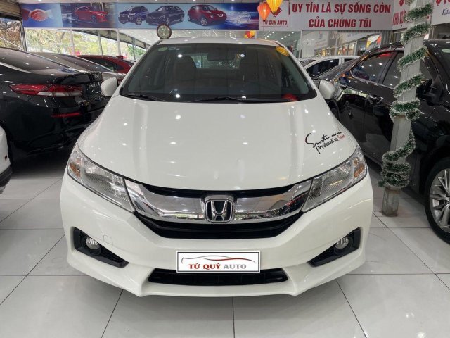 Cần bán lại xe Honda City sản xuất 2015, màu trắng0