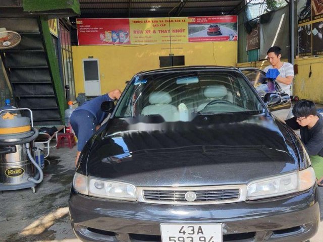 Cần bán Mazda 626 1994, màu đen còn mới, 82 triệu0