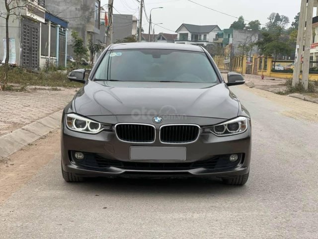 Cần bán nhanh chiếc BMW 320i model 2013, màu xám, bao zin từ a đến z0