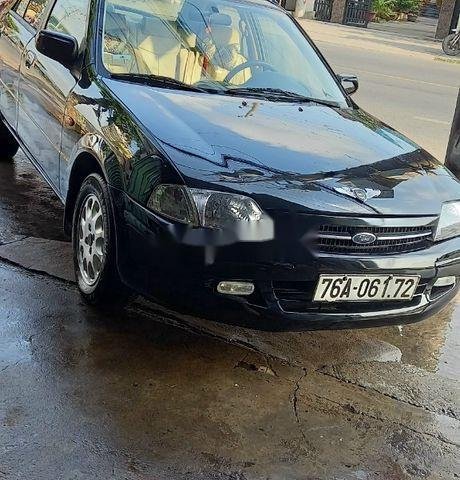 Cần bán gấp Ford Laser đời 2000, màu đen 0