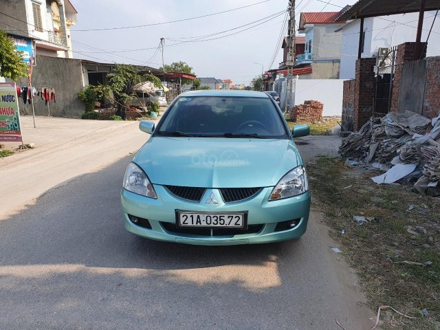 Xe nhà bán Mitsubishi Lancer 1.6 AT năm sản xuất 2004, nội thất đẹp để lại giá rẻ0