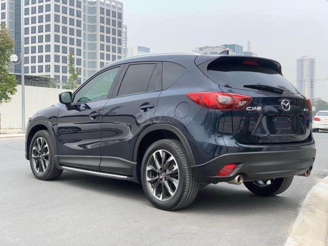 Cần bán Mazda CX 5 năm sản xuất 2016, màu xanh Cavansite0