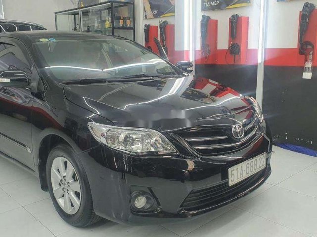 Cần bán Toyota Corolla Altis đời 2013, màu đen, xe gia đình