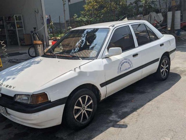 Cần bán lại xe Mazda 323 sản xuất 1994, màu trắng, nhập khẩu nguyên chiếc0