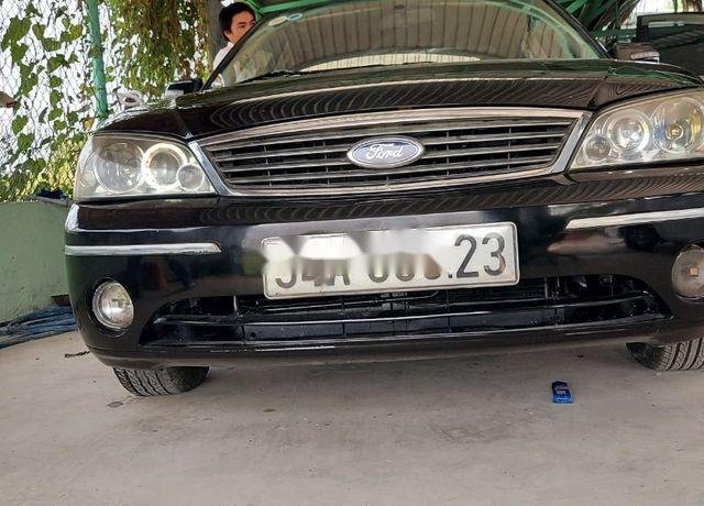 Cần bán Ford Laser sản xuất năm 2004, màu đen 