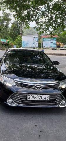 Bán ô tô Toyota Camry 2.0E sản xuất năm 2016, màu đen, giá tốt0