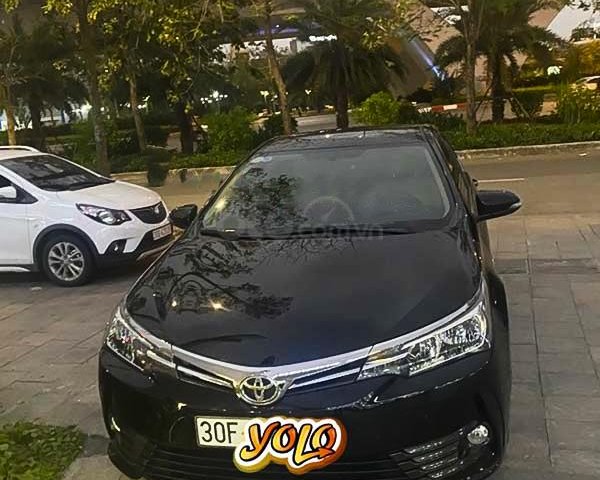 Cần bán lại xe Toyota Corolla Altis 1.8G AT sản xuất năm 2019, màu đen, 730tr0