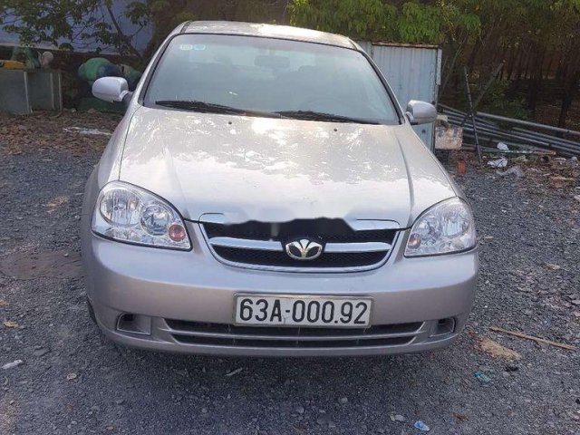 Bán ô tô Daewoo Lacetti 2011, màu bạc0