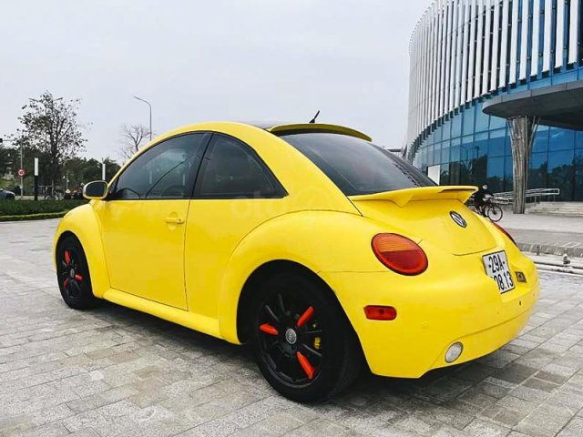 Bán Volkswagen New Beetle 2.0 AT năm 2004, màu vàng0