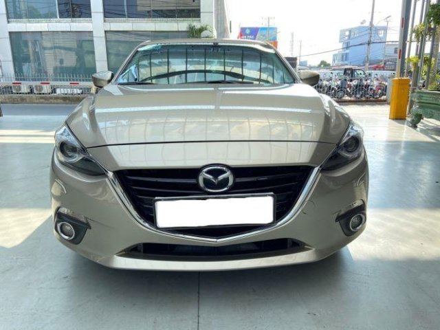 Bán ô tô Mazda 3 năm 2015, màu vàng cát, giá tốt0