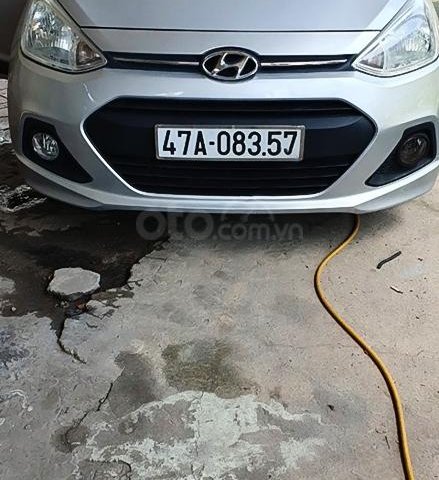 Cần bán xe Hyundai Grand i10 sản xuất 2014, màu bạc, nhập khẩu còn mới