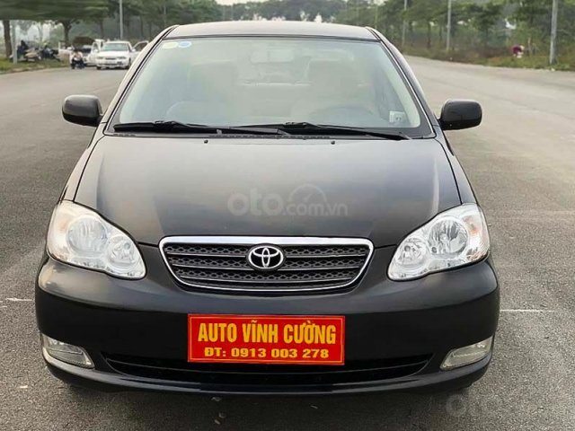 Cần bán gấp Toyota Corolla Altis đời 2004, màu đen