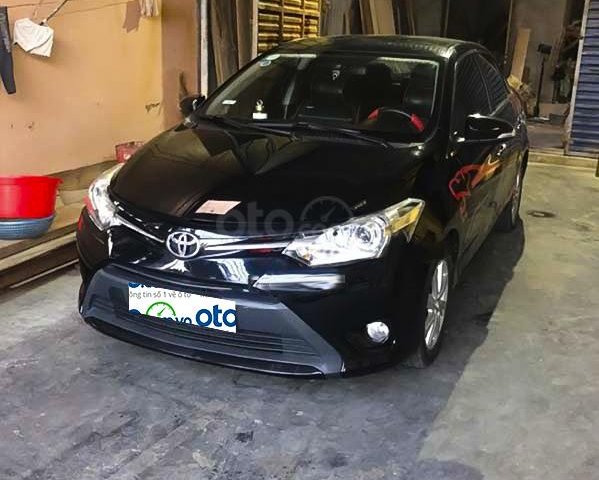 Cần bán gấp Toyota Vios năm 2014, màu đen0