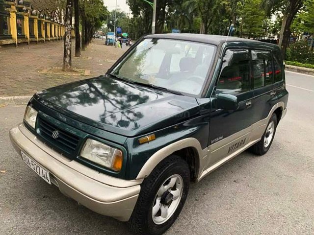 Cần bán Suzuki Grand vitara năm 2003, màu xanh lục còn mới0