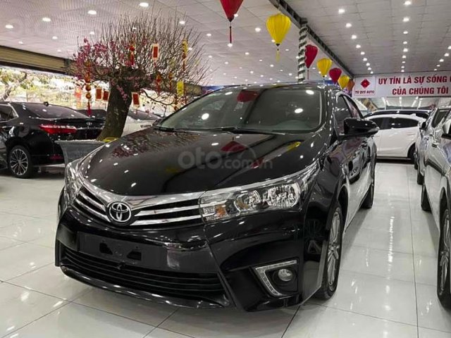 Cần bán gấp Toyota Corolla 1.8G sản xuất năm 2016, màu đen còn mới, 630tr