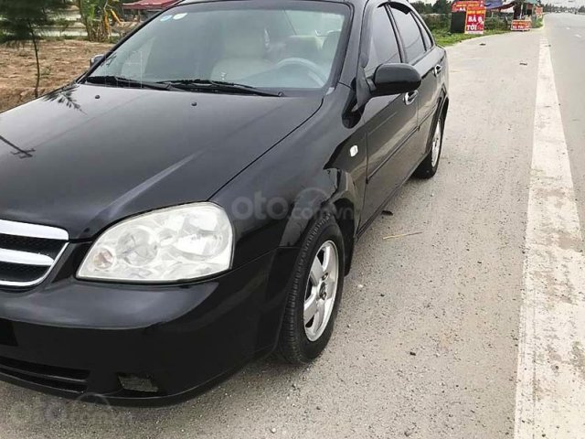 Cần bán xe Daewoo Lacetti năm sản xuất 2009, màu đen, giá tốt0