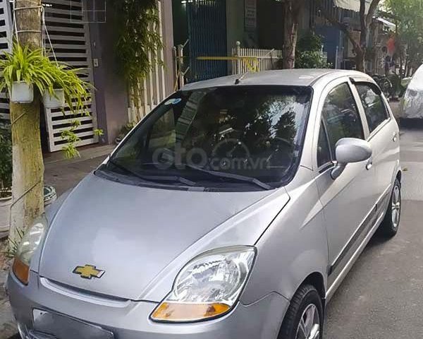 Cần bán xe Chevrolet Spark LT 0.8MT đời 2010, màu bạc còn mới0