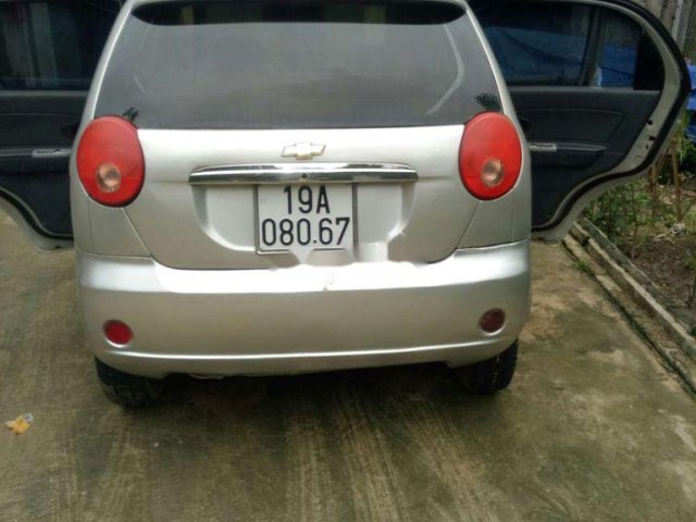 Cần bán lại xe Chevrolet Spark 2009, màu bạc0