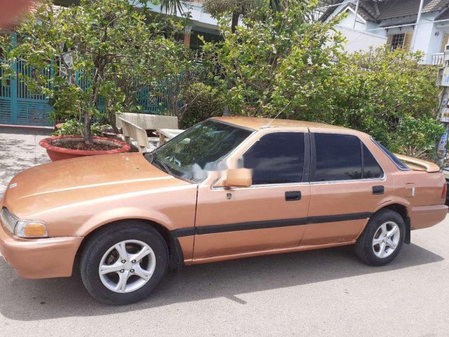 Cần bán gấp Honda Accord sản xuất 1986, xe nhập, màu cam0