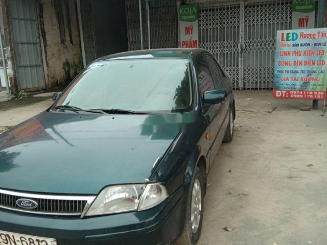 Cần bán xe Ford Laser năm 2002, màu xanh lục0