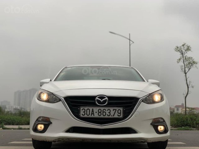 Bán ô tô Mazda 3 2015, màu trắng, xe còn mới0