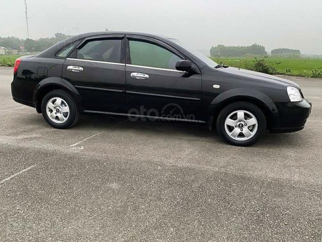 Bán ô tô Daewoo Lacetti năm 2011, màu đen còn mới0