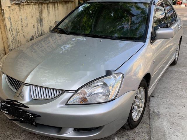 Cần bán lại xe Mitsubishi Lancer đời 2004, màu bạc, giá 165tr0