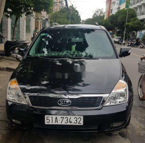 Bán ô tô Kia Carnival năm sản xuất 2010, màu đen, xe nhập 